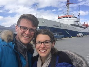 Chelsea and Ryan in front of their ship