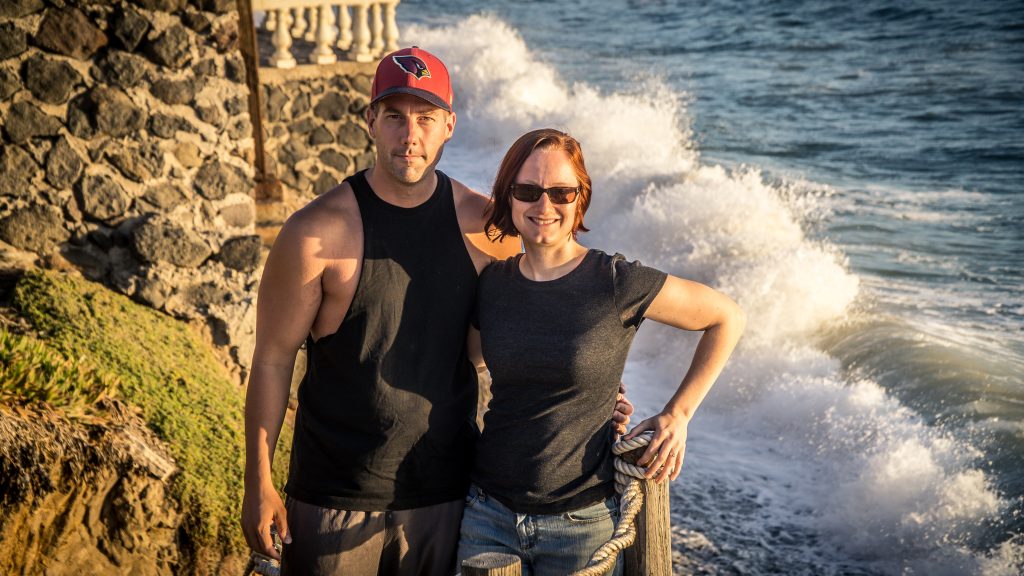 The wife and I in front of crashing waves!